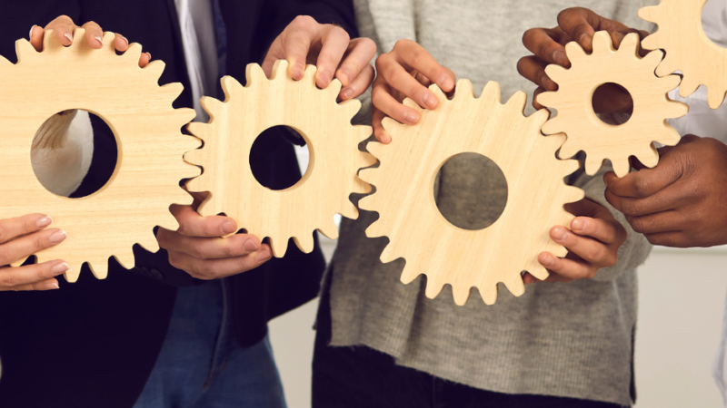 People holding gears.