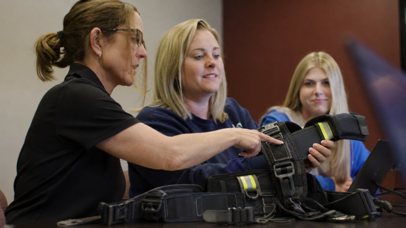 three women showcasing Polo Custom Products custom manufactured products